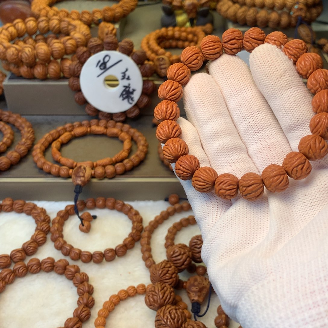 H***e桃核手串秦岭龙纹