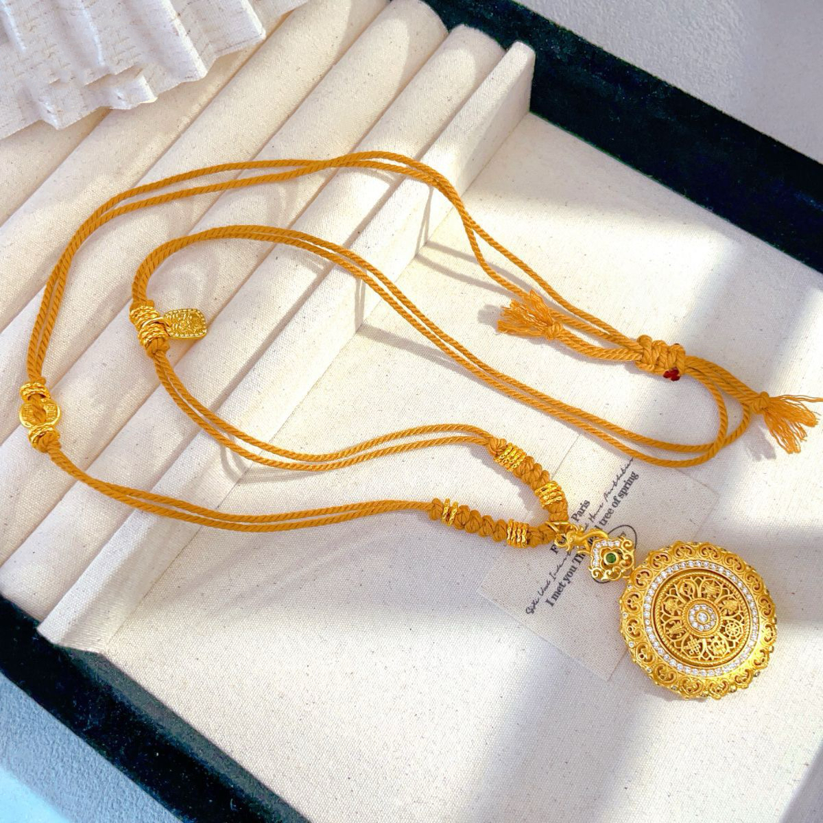 铜合金 合成立方氧化锆 镂空花丝可旋转八宝罗盘 编绳毛衣链