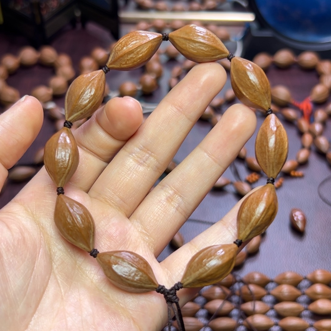 橄榄核手串/手链油 红皮三角核 1.25 2.4左右