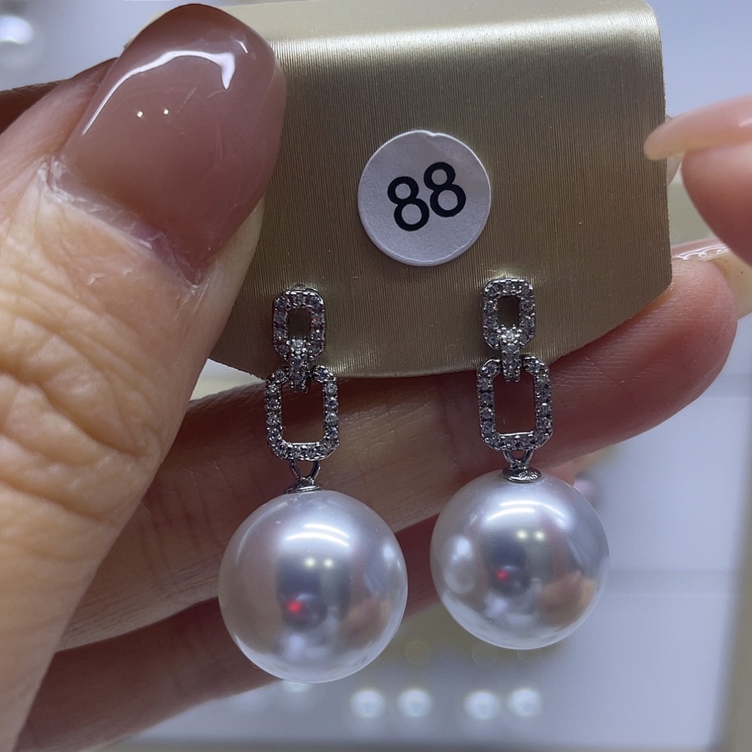 淡水珍珠银S925镶嵌耳饰