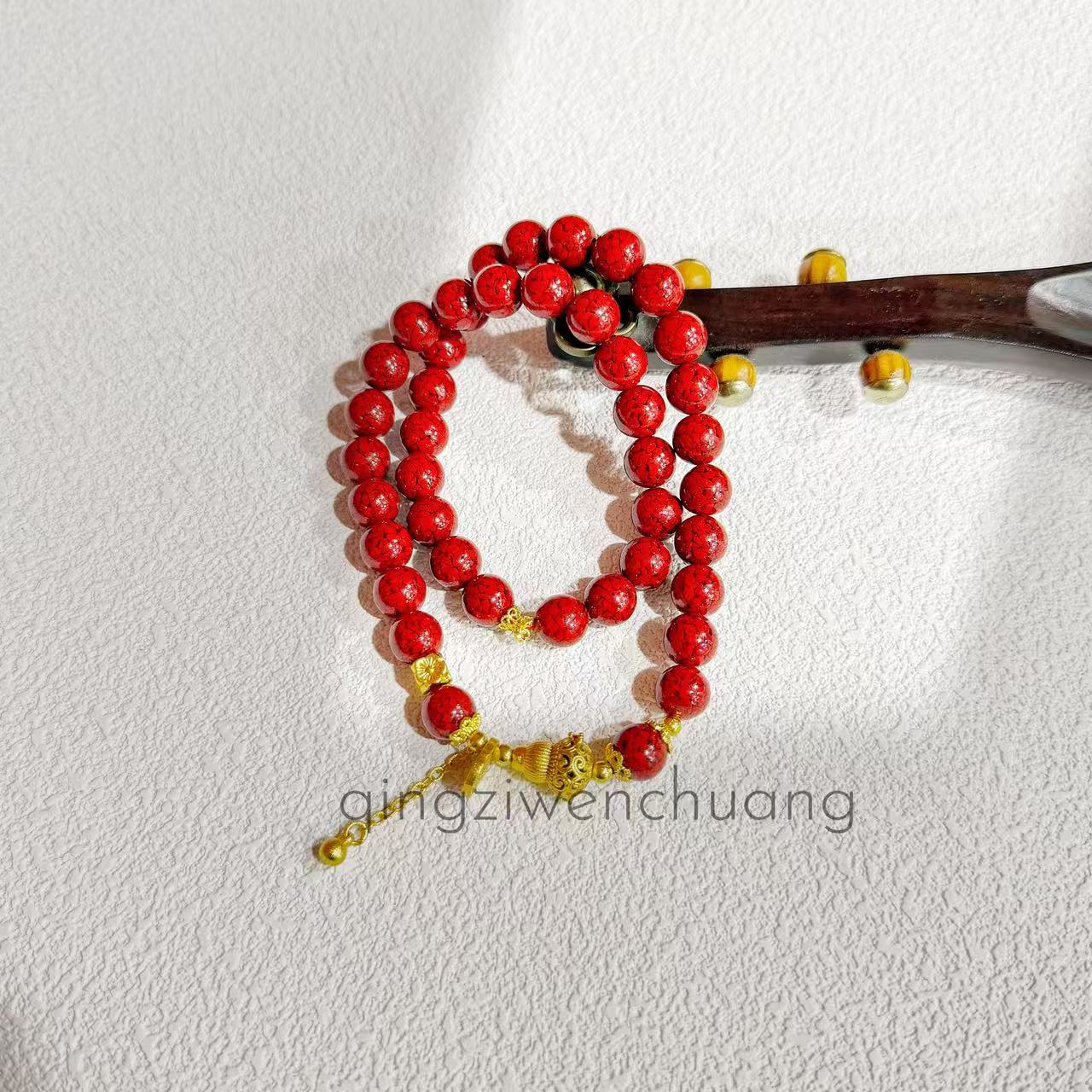 含辰砂工艺品DZ 1297-朱砂-8mm金色福牌双圈手串