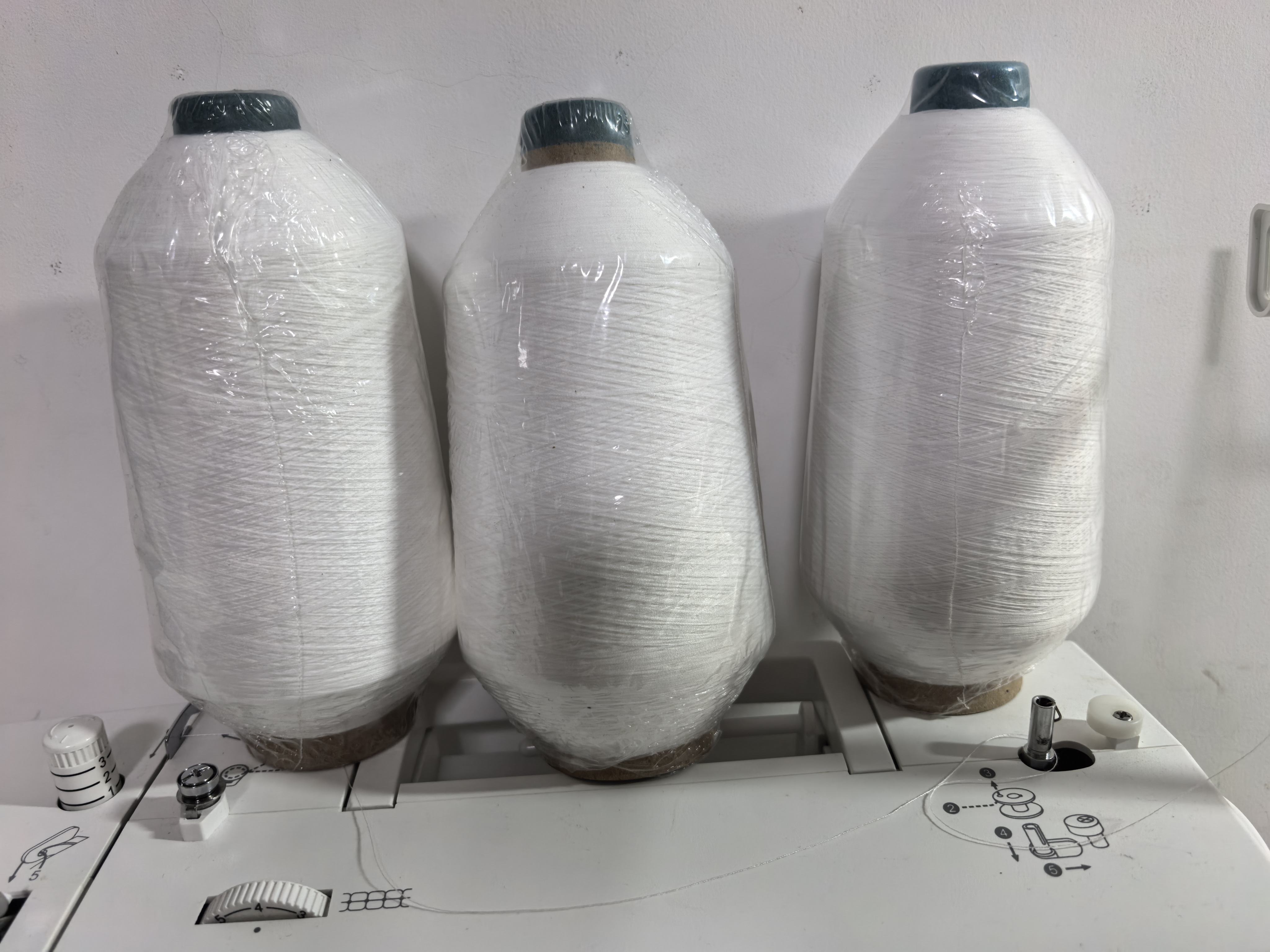 高弹线低弹丝缝纫专用线