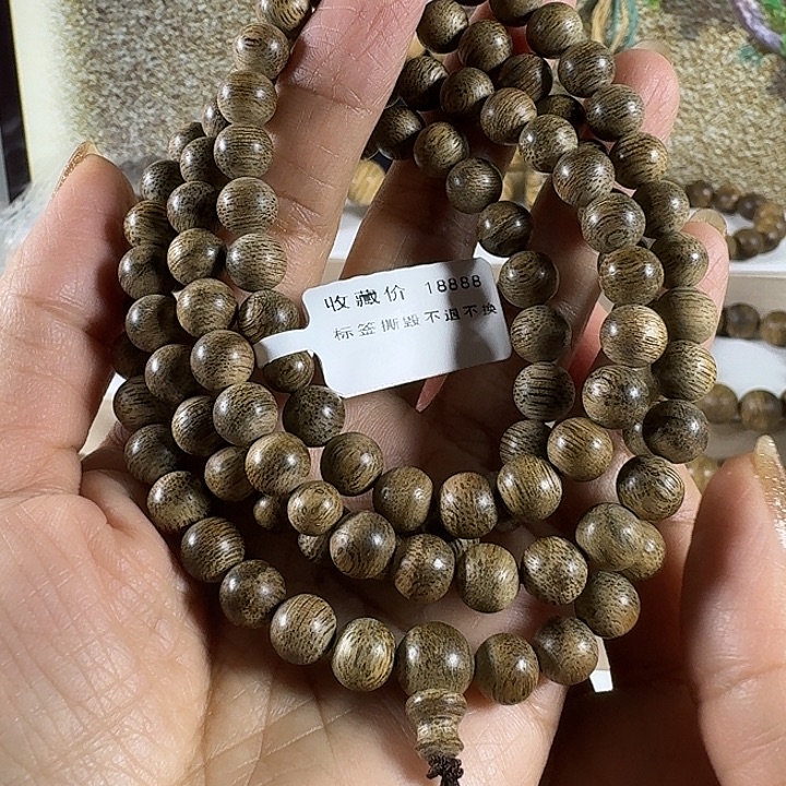 晨***在沉香手串纹莱老料