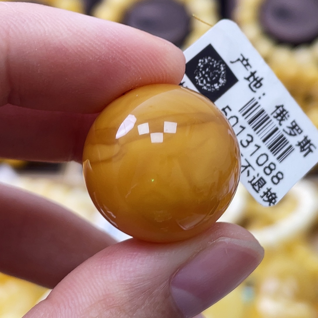 琥珀未镶嵌珠宝奇石20.6mm浓蜡鸡油红 瑕