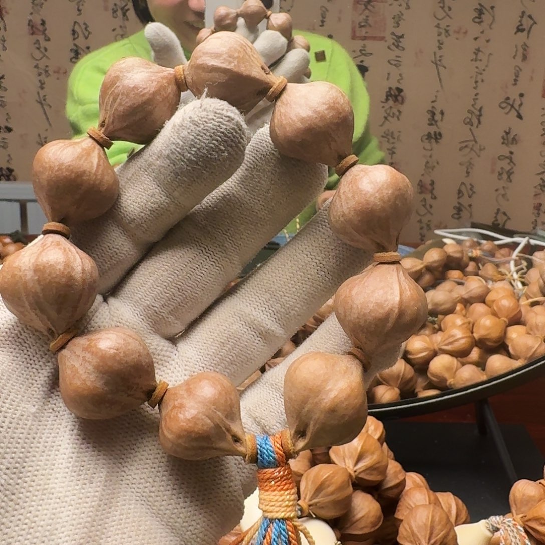 橄榄核把件三面佛