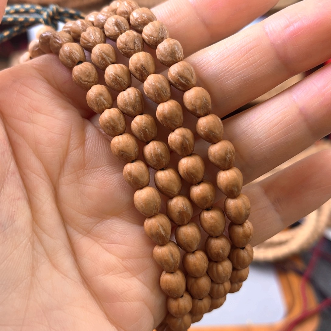 柏香籽/百香籽吊坠原装红牙