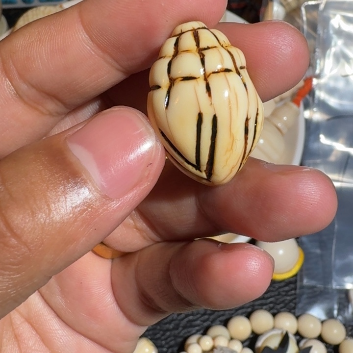 帅***橄榄核吊坠很漂亮一个