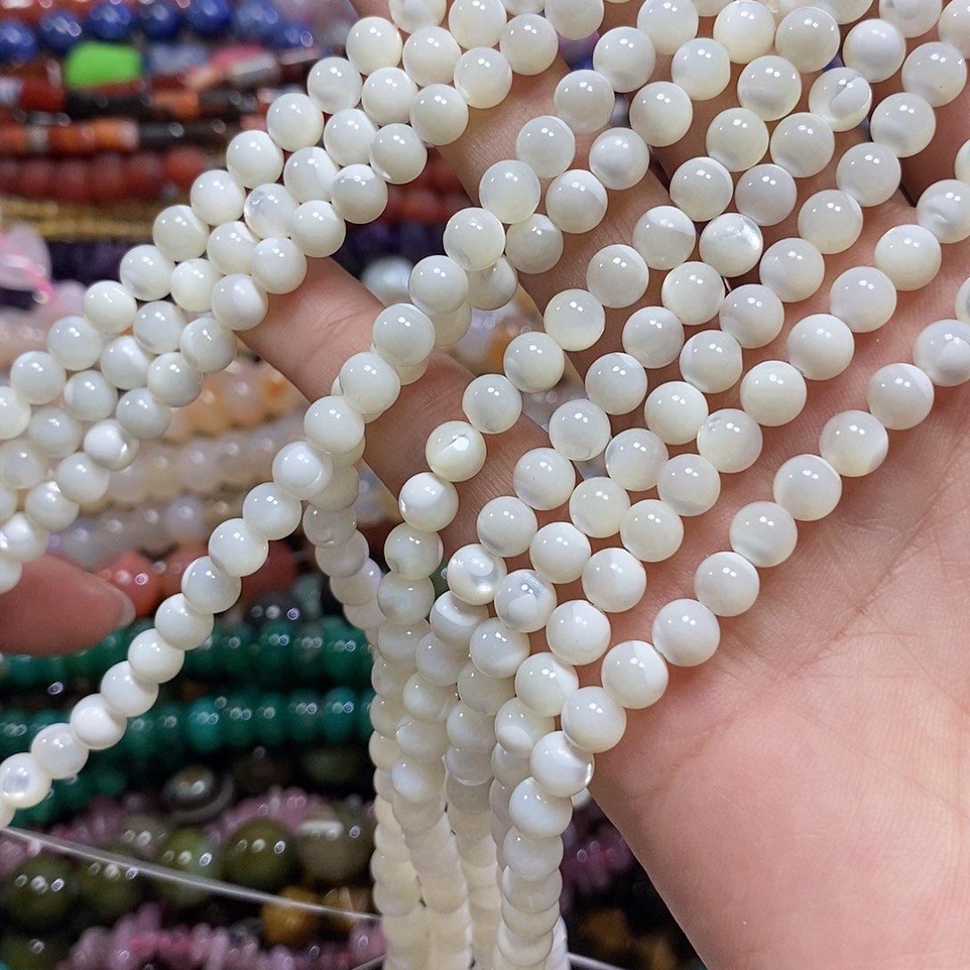 玛瑙/玉髓未镶嵌珠宝半成品白碟贝一条卡6mm