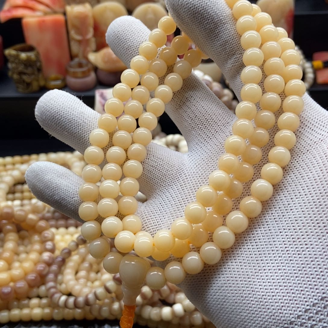 驼骨手串/手链8毫米黄透料108
