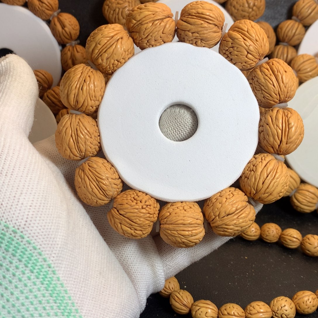 王***二手串桃核21龙鳞凤尾