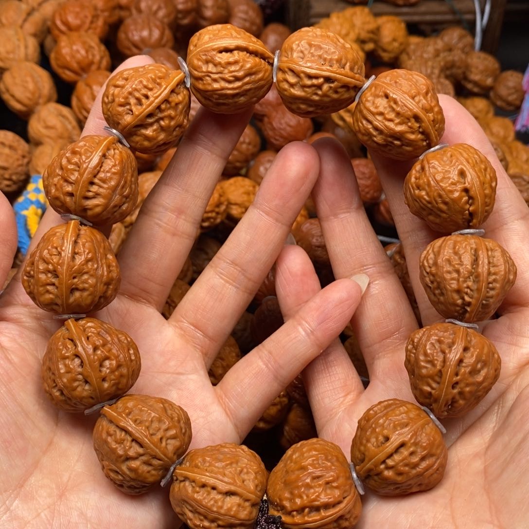 桃核手串麒麟桃心