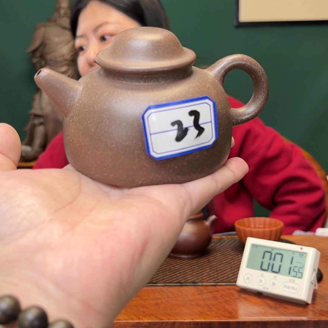 紫砂茶壶张**霸鱼翁壶半手