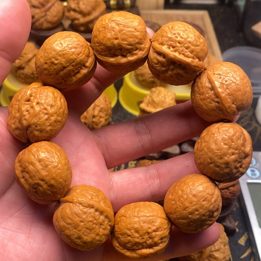 桃核把件蛇皮球手串