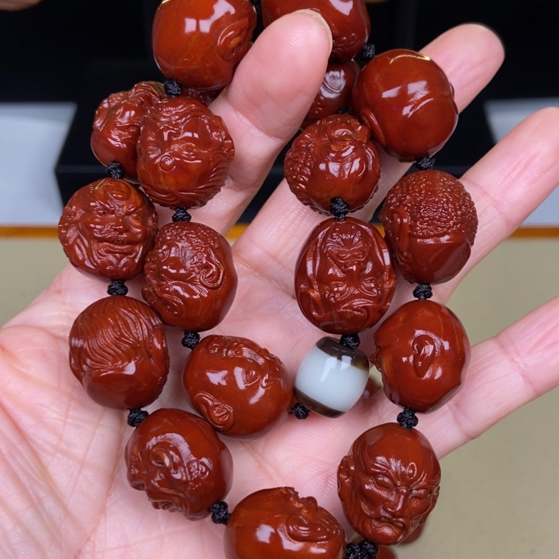 好***号橄榄核吊坠罗汉手持