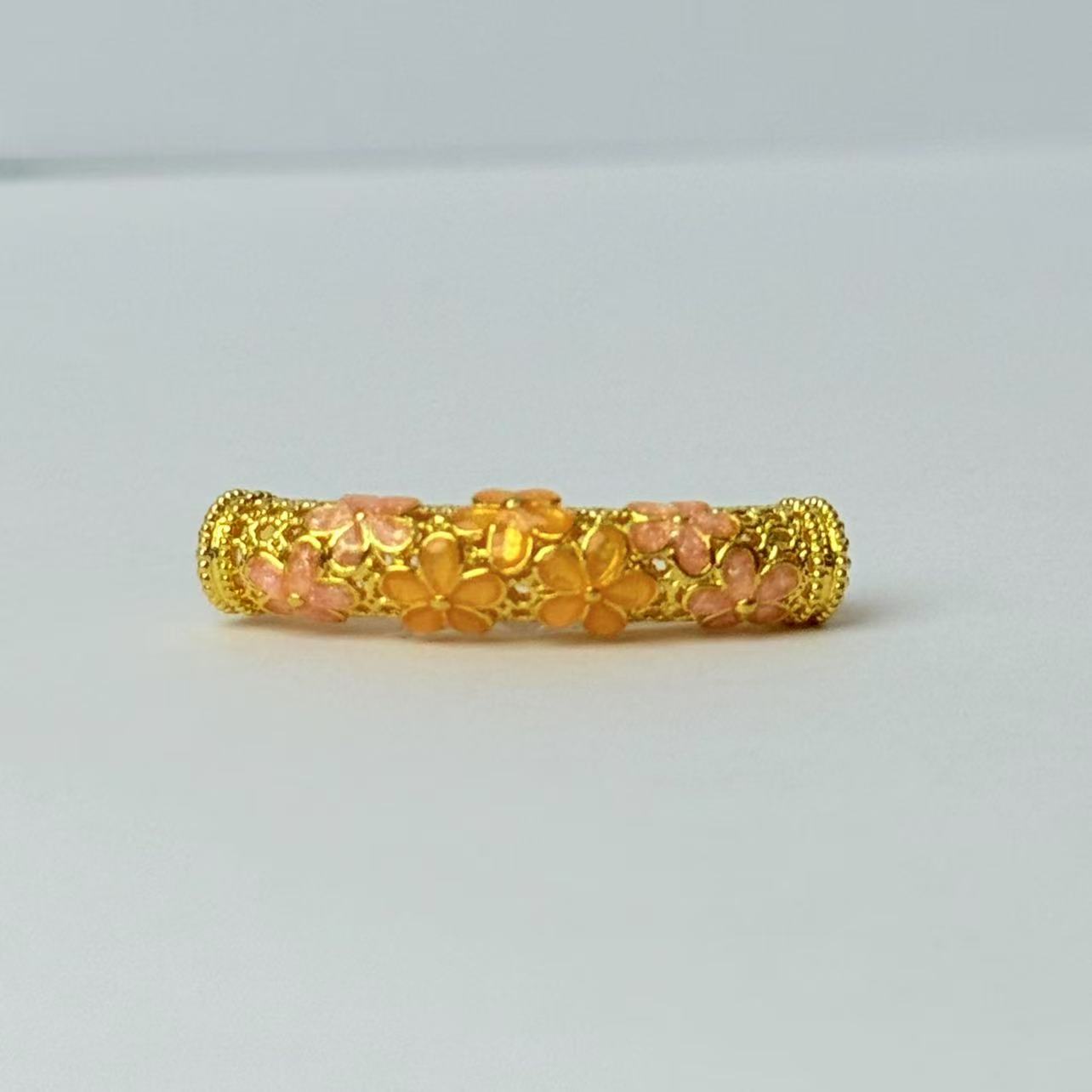 新金社黄金足金999粉色精品桃花弯管DP1389