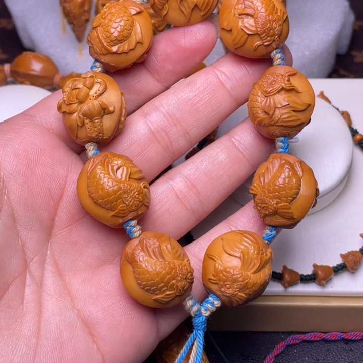 手串橄榄核莲花鱼