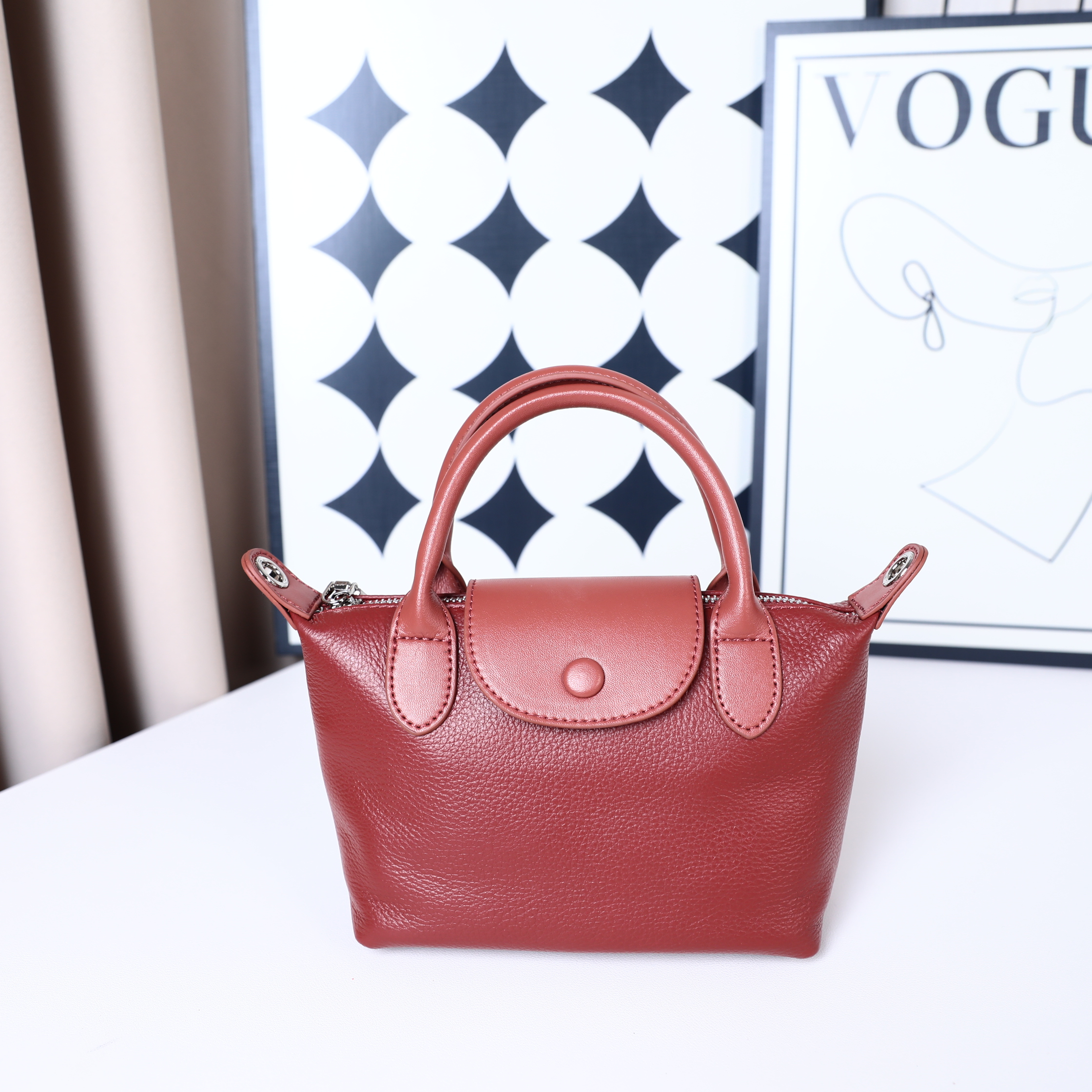 时代品牌时尚饺子包百搭斜跨包M10380