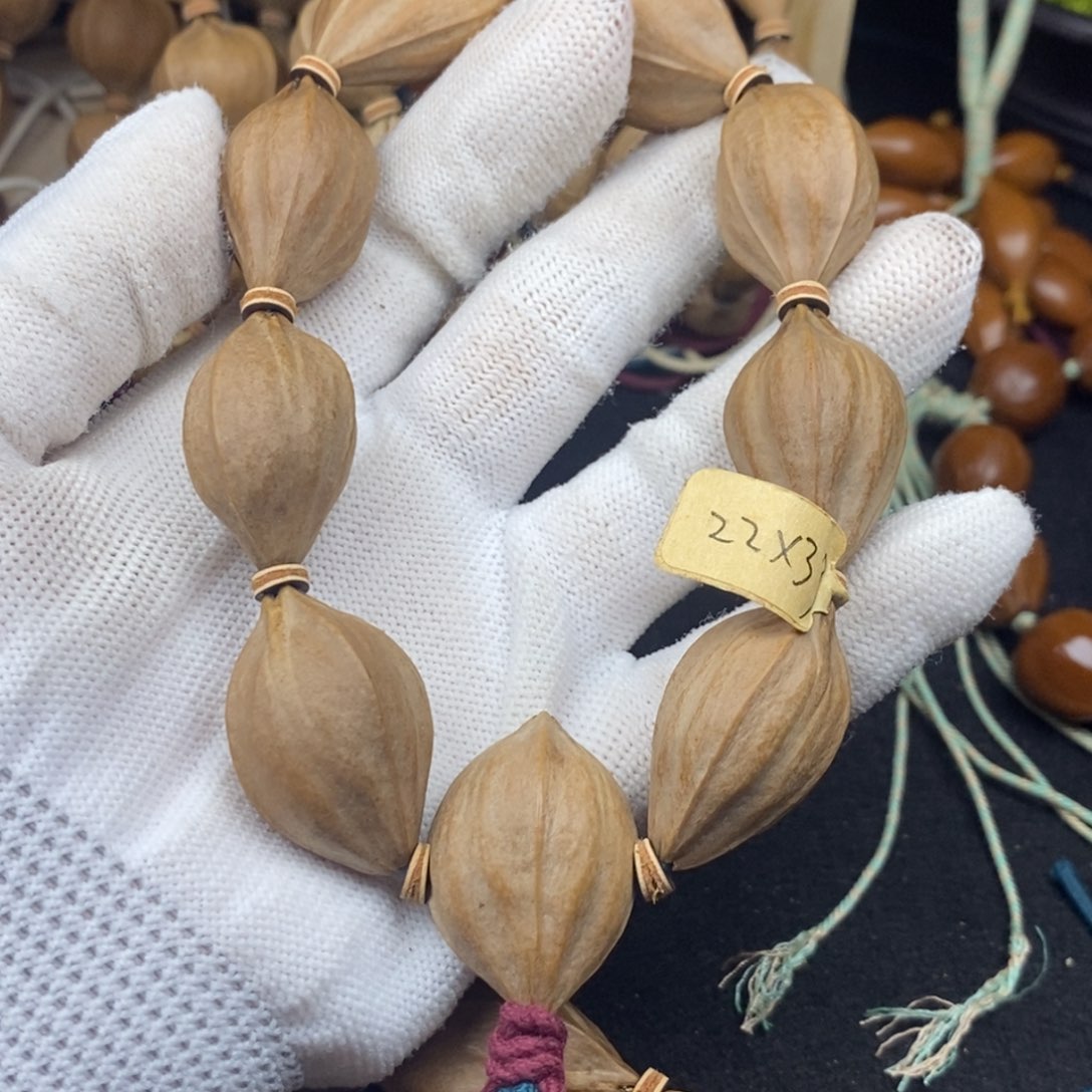 樊***樊手串/手链橄榄核2233四面佛9颗