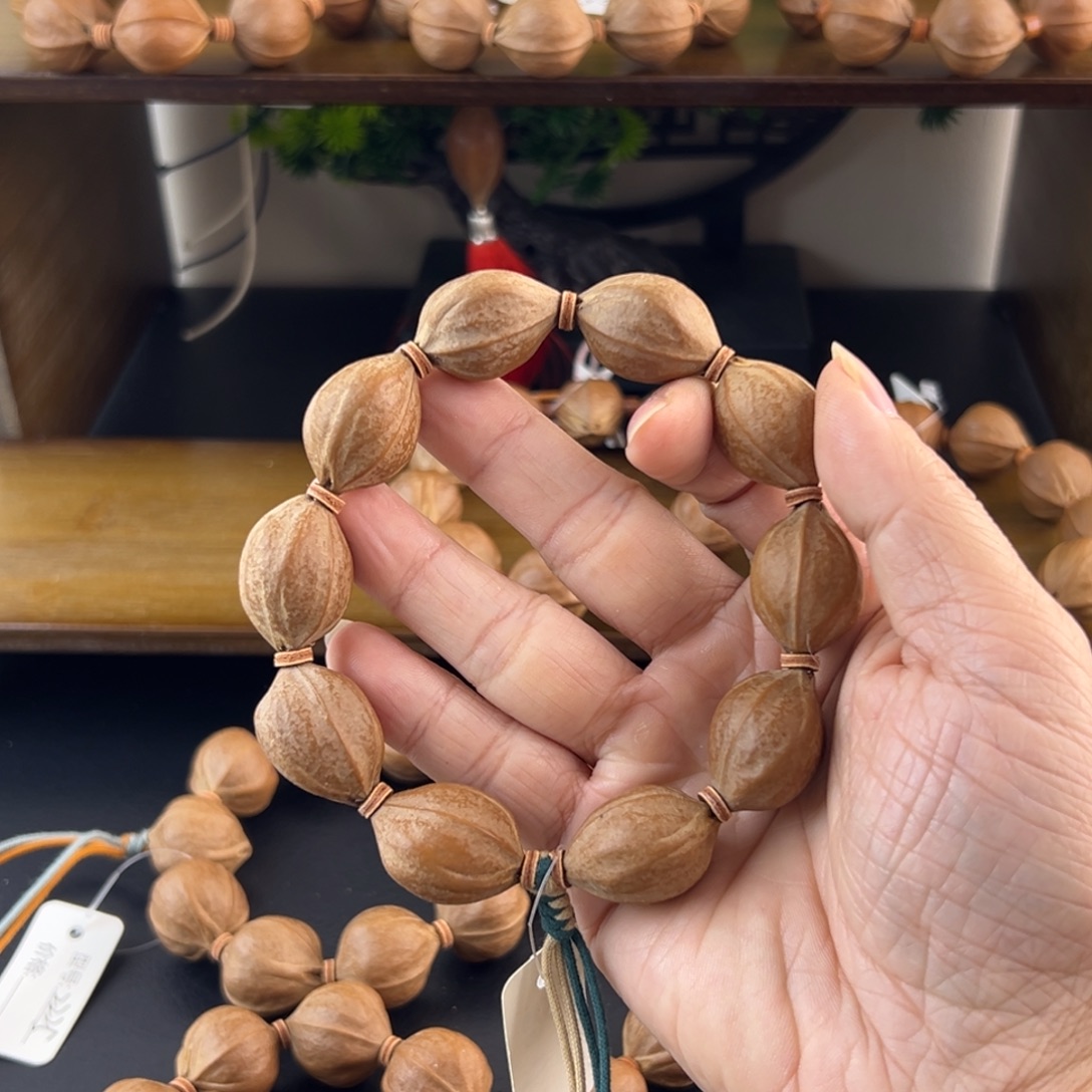 橄榄核吊坠梅林铁核老树核素串19.526