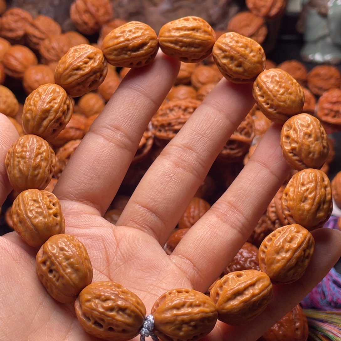 文玩核桃吊坠金丝玉枣