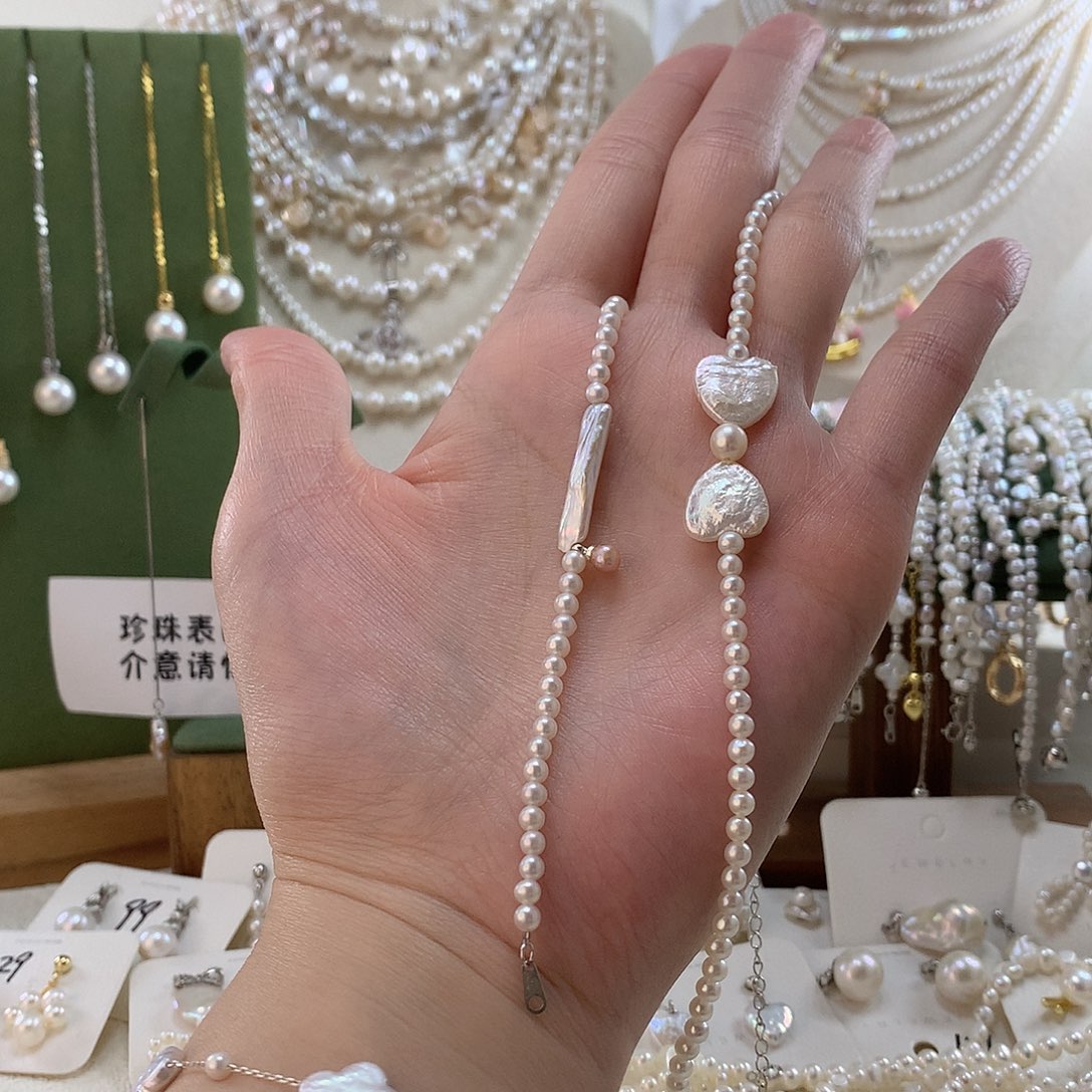 多***海银S925镶嵌淡水珍珠颈饰蝴蝶结小银条手链