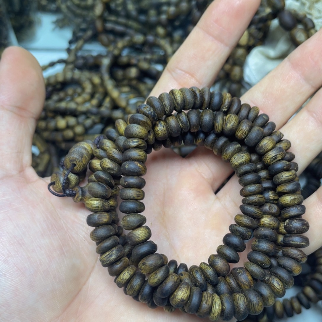 沉香碎屑沉香+沉水浮0.8算盘多圈25克加