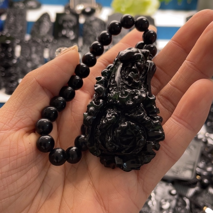 蛇纹石玉手把件未镶嵌大****钓