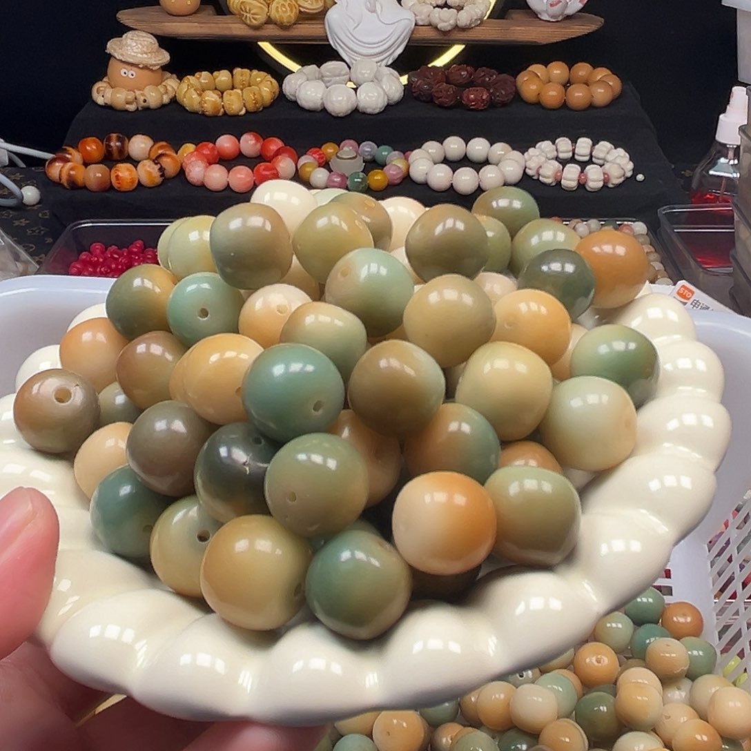 菩提根/象牙果手串100颗混装有裂瑕疵青苹果