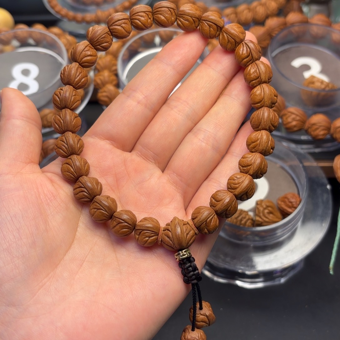 斑***睡桃核吊坠野生玉龙脊12手持