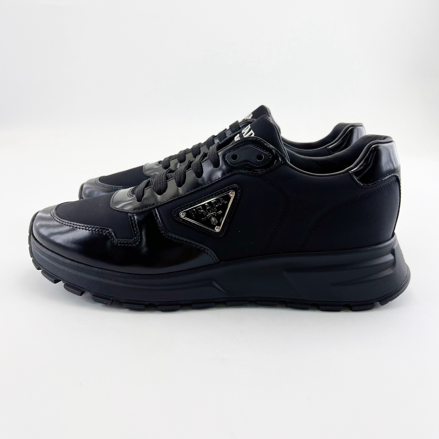 未使用 Prada/普拉达 41码/黑色牛皮织物三角标运动鞋/15909913