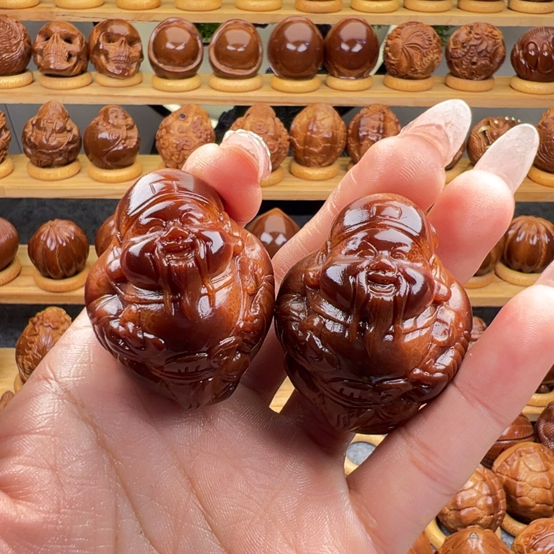 亠***手串/手链橄榄核官帽财神玉化