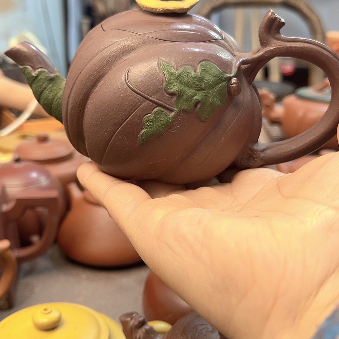 紫砂茶壶全手工制作和半手工制作