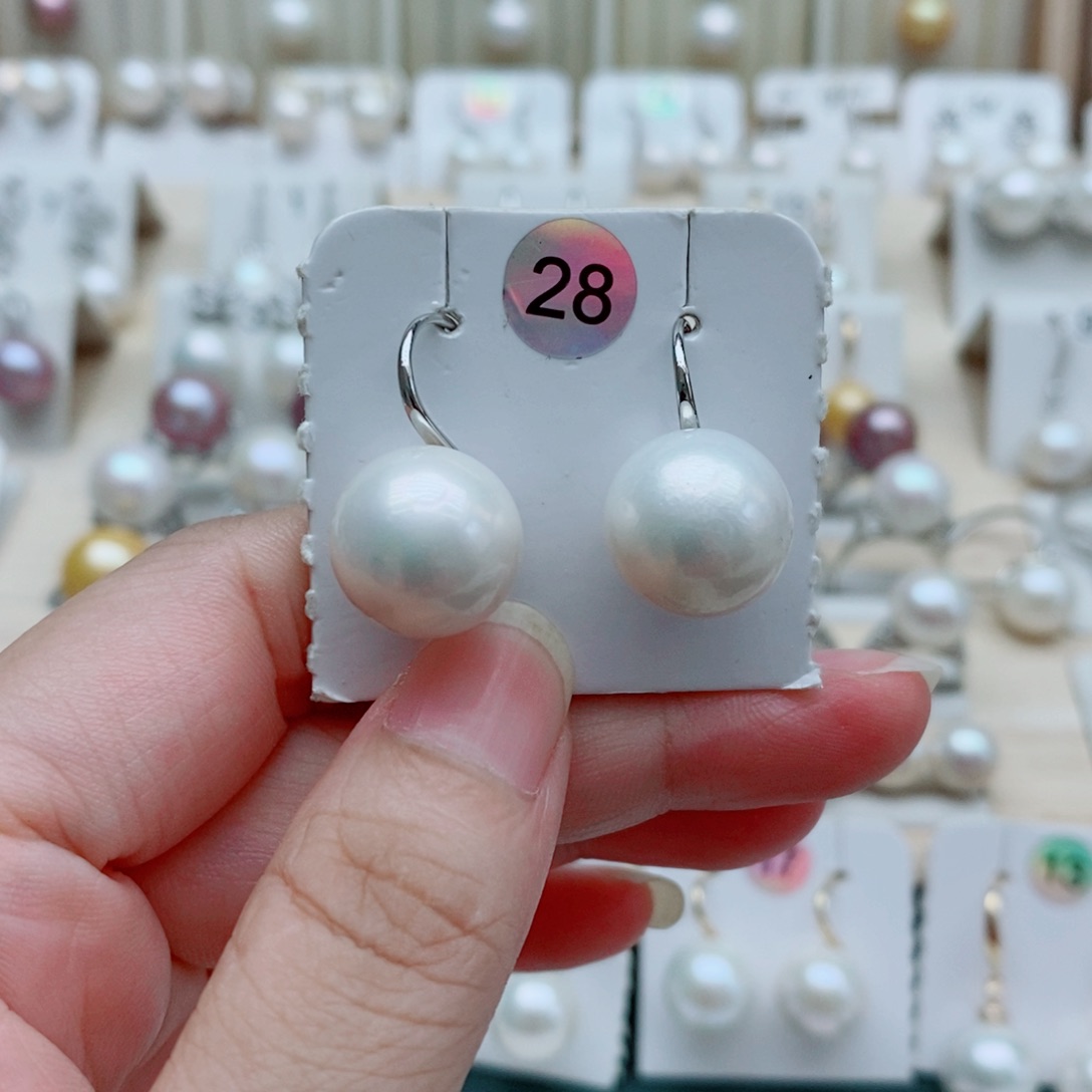 辛***甘银S925镶嵌淡水珍珠耳饰13mm