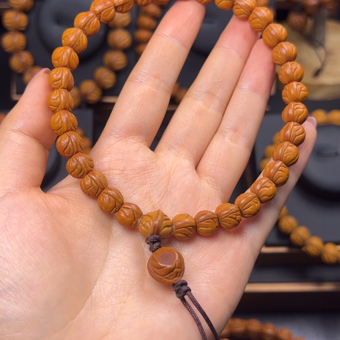 宇***』桃核手串野生玉龙脊0.9