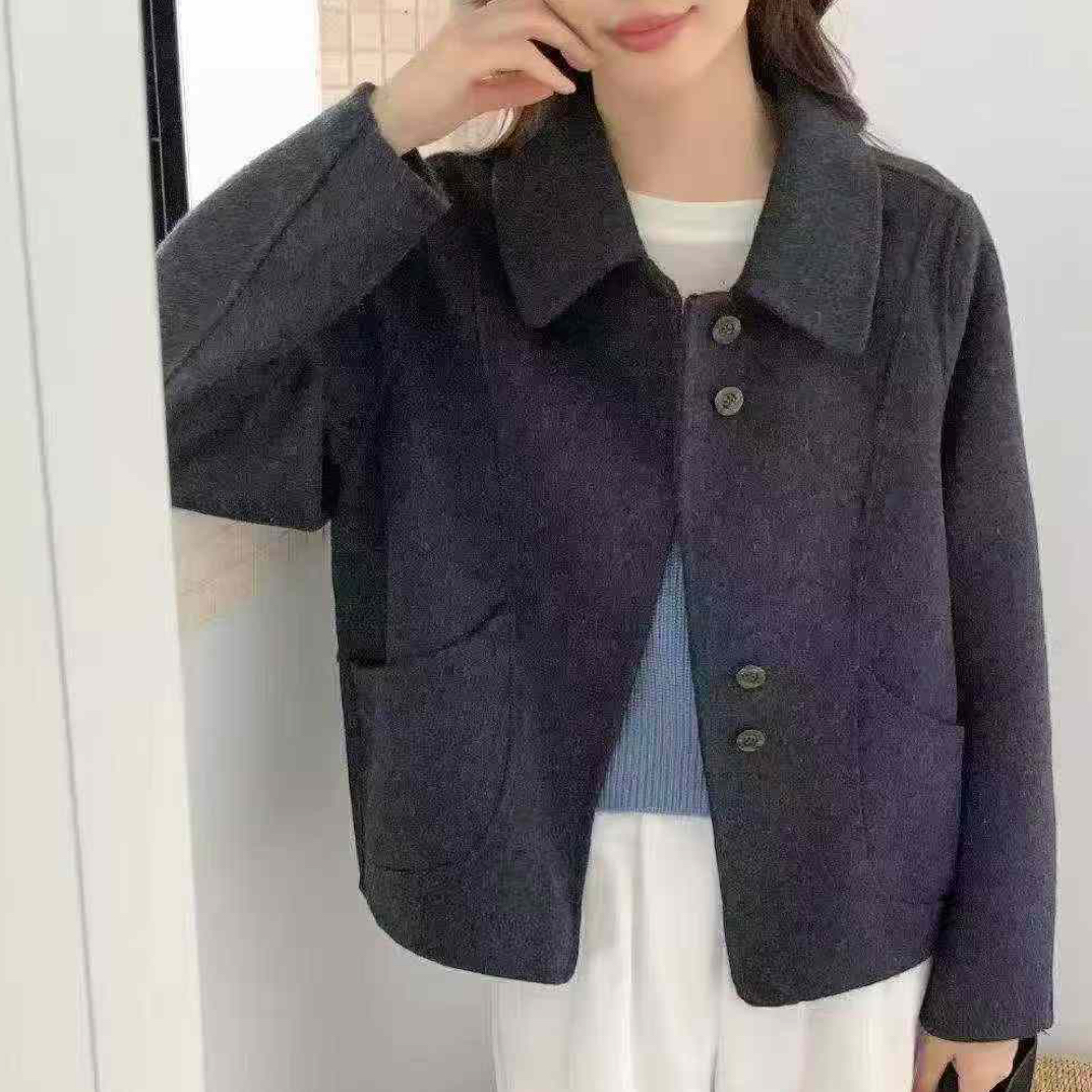 夏季新款设计感镂空v领针织上衣搭配牛仔短裤女装套装