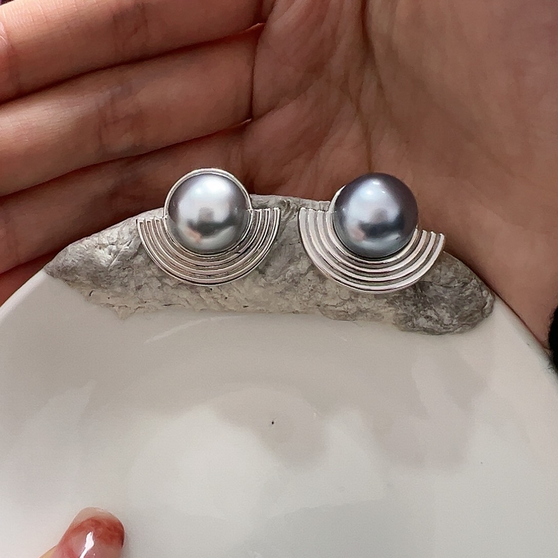 海水珍珠耳饰银S925镶嵌一****?