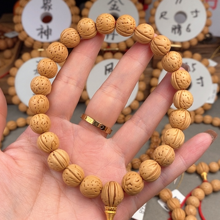 桃核手串金蝉子11.5A抛光板误差0.5