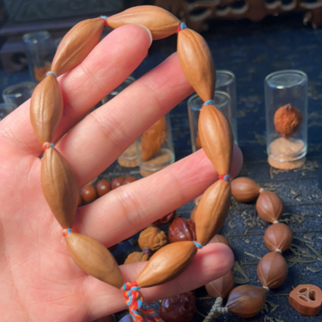 柳叶核素串 新粉福利 橄榄核素串 橄榄核雕刻散珠