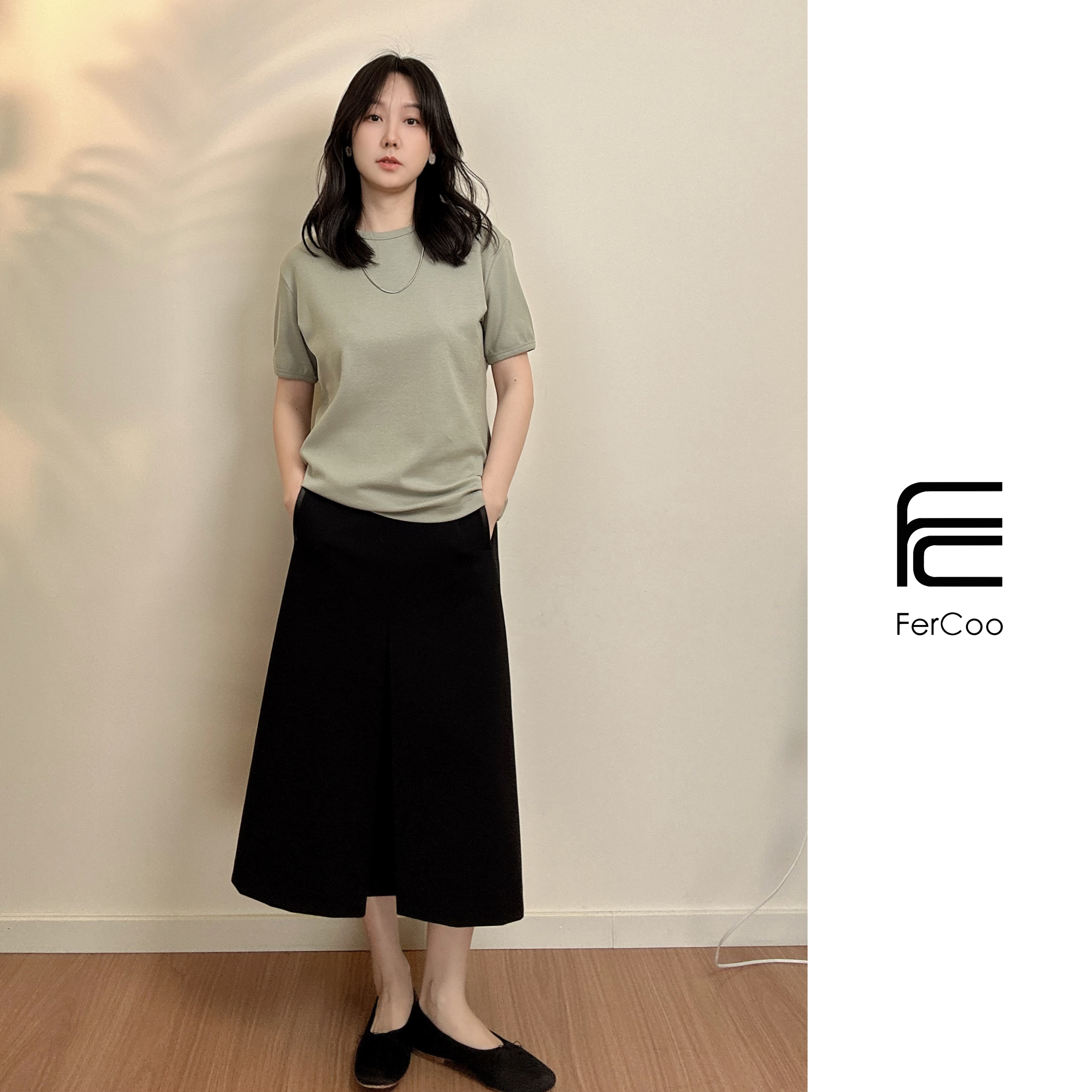 FERCOO气质显瘦高级拼皮腰头A字型微弹羊毛半裙