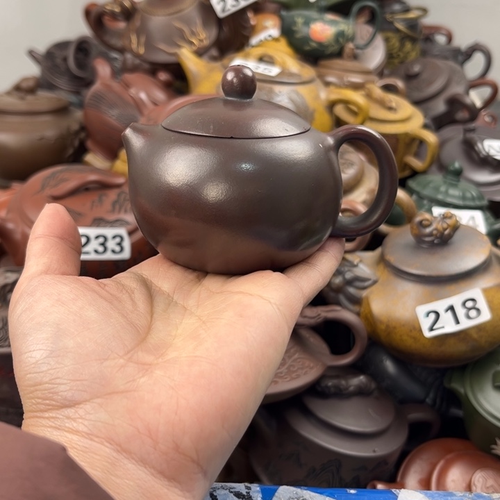 紫砂茶壶盖子磕的