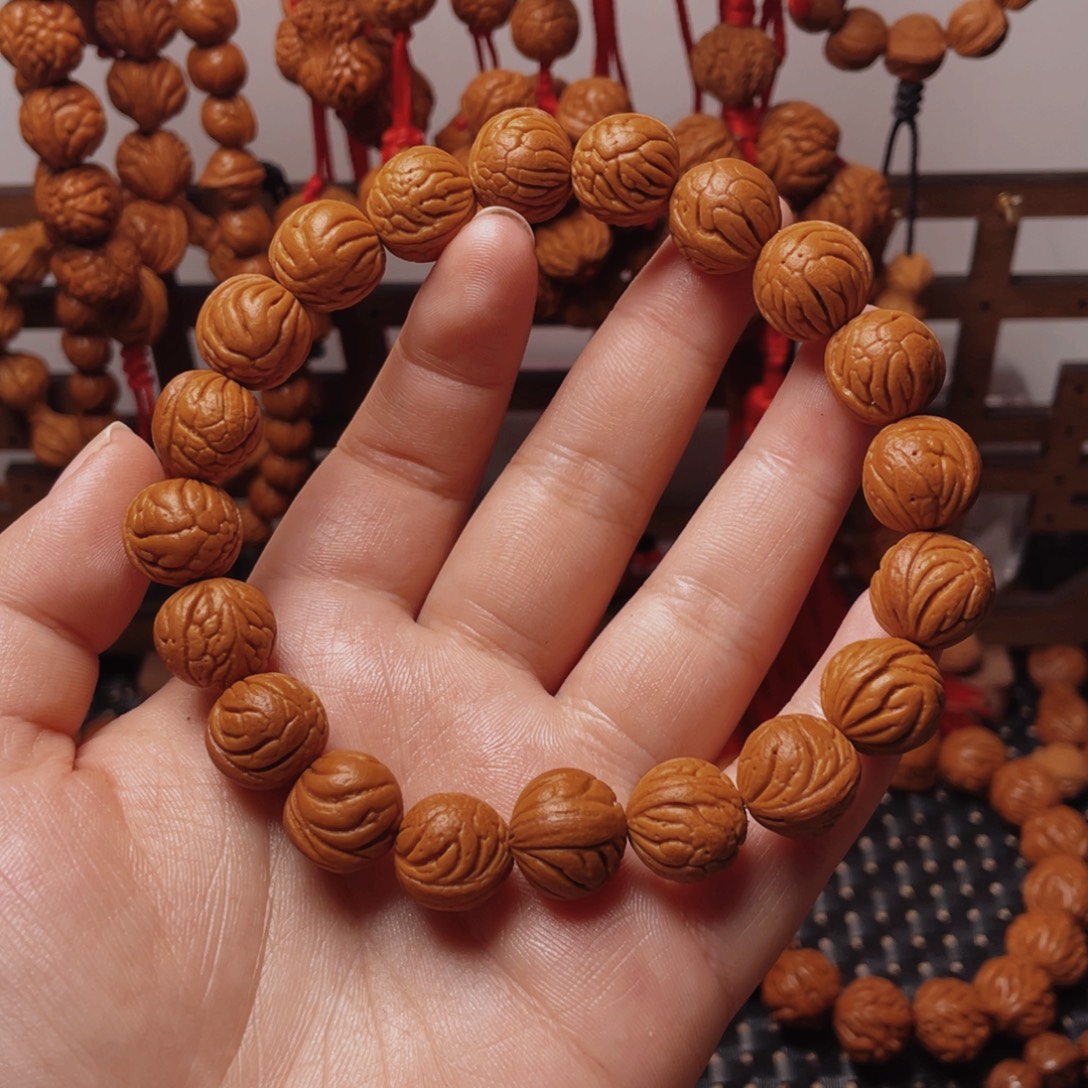 木质类龙纹桃枭手串