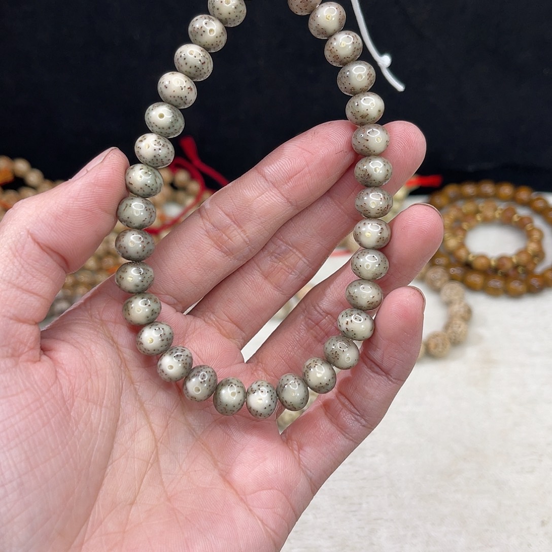 六***七吊坠星月菩提9苹果手持