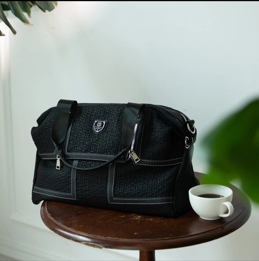 2024新款经典百搭手提单肩斜跨网红高质感黑色邮差女大包569真皮