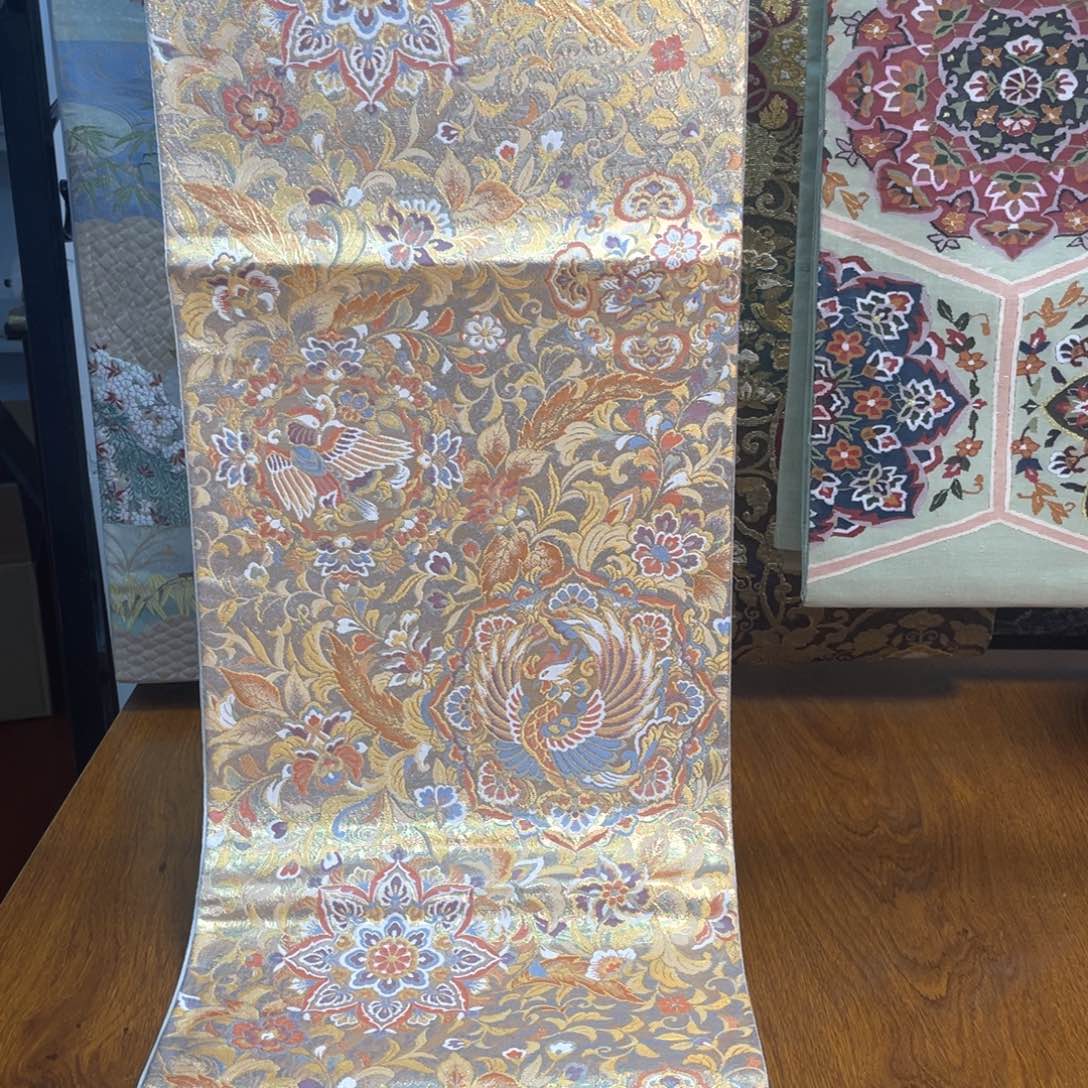 织绣彫金凤凰宝相