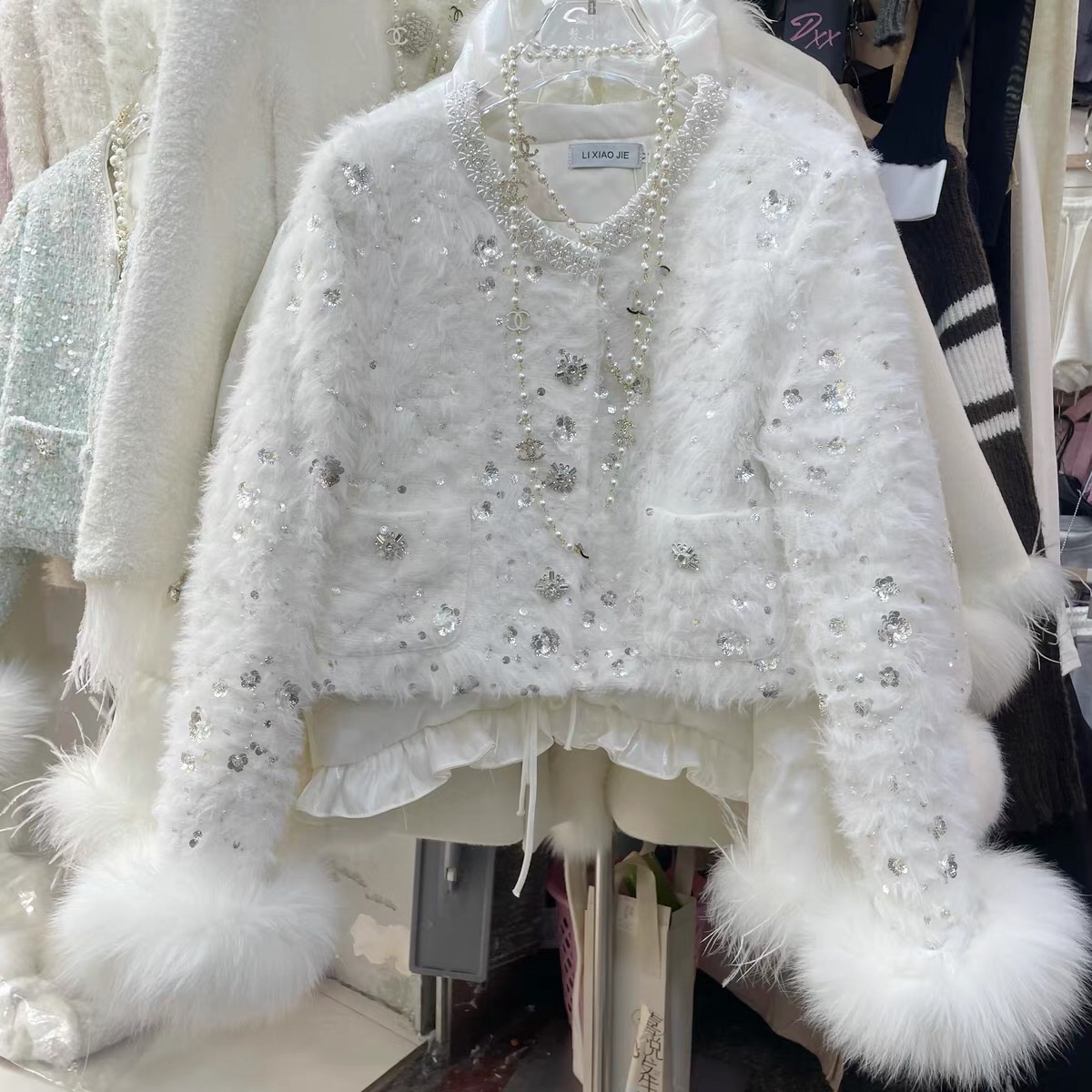 （139.9-299.9）南油花财实体女装气质时尚