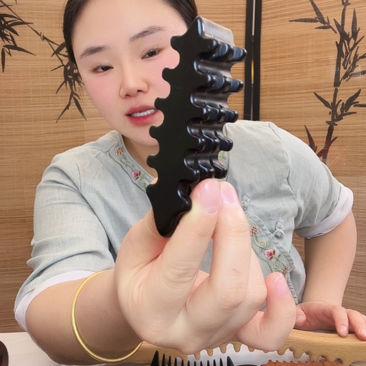 紫光檀小号手把件瑕疵