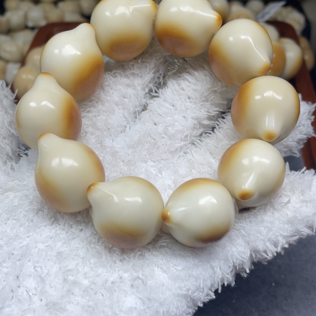 奶****手串菩提根/象牙果12.6.50瑕猫头卡29
