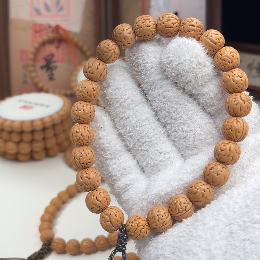 L***g手串桃核1.2加「小粗金」野生桃核手持