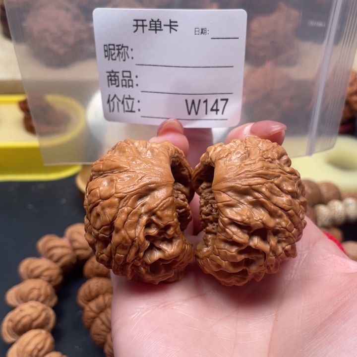 用***1把件桃核文玩的好的人