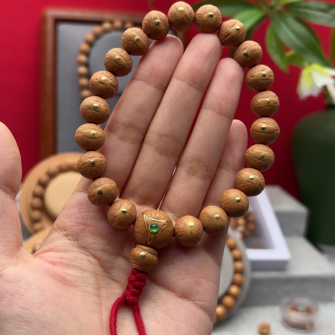 凤眼菩提手串12.4左右铜钉镶嵌手串
